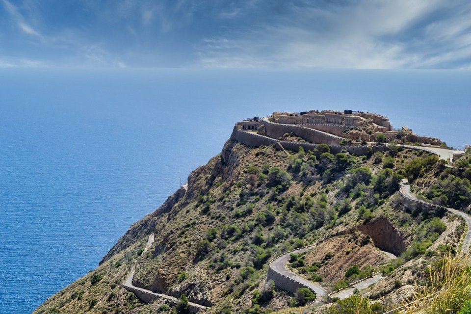 Mountain grounding the ocean and sky